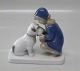 Bing and 
Grondahl  B&G 
2163 Girl with 
dog Claire 
Weiss 11 cm 2. 
Marked with the 
three Royal ...