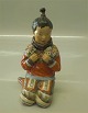 Royal 
Copenhagen 
12415 Greenland 
girl 5.5"  
Inuit i 
national dress 
by Carl 
Martin-Hansen 
The ...