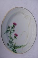 RC. Thistle, 
hand painted 
Royal 
Copenhagen 
porcelain. 
Painted 
thistle, green 
and purple 
colored, ...