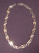 Silver 
Necklace.
Stamped 830 
J.H
Length: 40 cm
Width: 1 cm
Ca from the 
year 1970