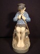 Royal 
Copenhagen, 
boy sitting on 
the stone No. 
905 
1.st choice 
perfect 
condition.
LytLæs ...
