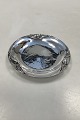 Georg Jensen 
Sterling Silver 
Blossom Wine 
Coaster 2A. 
Measures 13cm 
and is in like 
new condition.