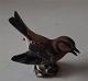 Dahl Jensen 
bird 1320 
Parula Warbler 
(DJ) 9.2 cm  
Marked with the 
Royal Crown and 
DJ Copenhagen. 
...