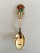 Anton Michelsen 
Christmas Spoon 
1925 Gildedd 
Sterling Silver 
with Enamel
The Poinsettia 
is a ...