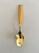 Anton Michelsen 
Christmas Spoon 
1960 Gilded 
Sterling Silver 
with Enamel
The shaft is 
divided ...