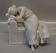 Royal 
Copenhagen 349 
RC Woman crying 
on a chair 1901 
 17 x 21 cm In 
mint and nice 
condition