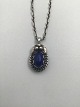 Georg Jensen 
Sterling Silver 
Annual Pendent 
1992 with Lapis 
Lazuli Measures 
2.8 cm (1.10 
inch) ...