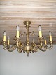 Chandelier of 
brass.
 8 armed.
 Diameter: 80 
cm, Height: 55 
cm