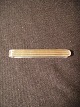 Tie pin. Hans 
Hansen.
 Silver 925
 Length: 5.5 
cm
 Width: 7 mm
 Nypoleret 
appears as ...