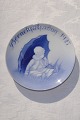 Royal 
Copenhagen 
porcelain. 
Children Aid 
Days plate, 
Girl unnder 
umbrella, from 
1927. diameter 
...