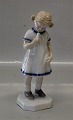 Bing and 
Grondahl B&G 
2470 Girl with 
ice lolly 18.5 
cm SB Marked 
with the three 
Royal Towers of 
...