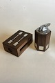 Hans Hansen 
Palisander and 
Sterling Silver 
Matchbox and 
Lighter.
Lighter 
measures 10,2 
cm and ...