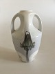 Royal 
Copenhagen Art 
Nouveau Vase 4 
handles with 
Dandelion motif 
No 342/220. 
Measures 14cm 
and ...