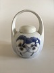 Royal 
Copenhagen Art 
Nouveau Vase 
with handle No 
238/29B. 
Measures 11,5cm 
and is in good 
condition.