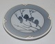Royal 
Copenhagen Art 
Nouveau Plate 
with bird No 
1703. Measures 
9,3cm and is in 
good condition.