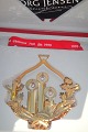 Christmas 
Candles 1999, 
The Christmas 
Ornament from 
Georg Jensen. 
Gilded brass. 
Design : Nina 
...