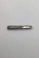 N.E. From Tie 
bar in Sterling 
silver. 
Measures 5,2cm 
and is in good 
condition.
