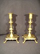 pair of brass 
candlesticks 
with feeder.
 cost kr 650, 
-
