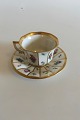 Royal 
Copenhagen 
Henriette Doll 
Cup and Saucer 
No 8519. Cup 
measures 6cm 
dia and 4,5cm 
high.
