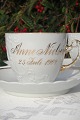 Couple silver 
wedding cups of 
white porcelain 
with gold 
decoration. 
Anne Nielsen 
and Christian 
...