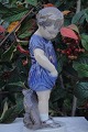 Royal 
Copenhagen 
figurine. Royal 
Copenhagen Boy 
with teddy bear 
no. 3468. 
Height 18 cm. 
1. ...