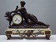 Old Mantel 
clock in art 
nouveau - 
patinated metal 
and 
varicoloured 
marble
lenght 48 cm - 
Height ...