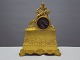 French vintage 
mantel clock 
made of gilded 
metal. From 
middle of the 
18th century
 The clock ...