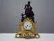 Old french 
mantel clock 
made of 
patinated and 
gilded metal
Height 38 cm
The clock is 
working ...