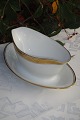 RC Porcelain 
Royal 
Copenhagen  No. 
607. White 
porcelain with 
wide gold rim. 
Sauce boat No. 
...
