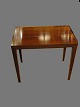 Rosewood side 
table.
Haslev 
Furniture 
Severin Hansen
H: 50 cm. L: 
58.5 cm. W: 
35.5 ...