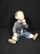 Boy with apple.
 Royal 
Copenhagen RC 
no 4680
 First sort
  price Dkr. 
850, -