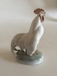 Royal 
Copenhagen 
Figurine Cock 
head up No 
1126. Measures 
11 cm x 8 cm / 
4 21/64" x 3 
5/32" and ...