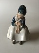 Royal 
Copenhagen 
Figurine Girl 
Knitting No. 
1314. Measures 
15 cm (5 29/32 
in.)  and is in 
good ...