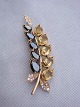 Broche.Ciriner 
and hematite 
and zirconia.
 Length: 8.5 
cm Width: 2.5 
cm Weight: 22.3 
grams
 ...