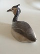 Royal 
Copenhagen 
Figurine Grebe 
No. 3263. 
Measures 10 cm 
/ 3 15/16 in. x 
17 cm / 6 11/16 
in. and ...