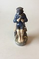 Royal 
Copenhagen 
Figurine Boy 
Cutting Stick 
No 905. 
Measures 19 x 9 
cm / 7 31/64" x 
3 35/64" and 
...
