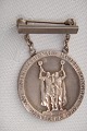F. Hingelberg 
silversmith 
Aarhus. Silver 
Medal from 
1962. Medal 
sterling 925. 
Diameter 2,5 cm 
...