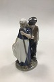 Royal 
Copenhagen 
Figurine 
Harvest People 
No 1300. 
Designed by 
Christian 
Thomsen. 
Measures 20 cm 
...