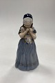 Royal 
Copenhagen 
Figurine Girl 
from Bornholm 
No. 1323. 
Measures 22 cm 
/ 8 21/32 in. 
Designed by ...