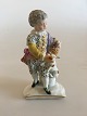Meissen 
Figurine Boy 
with Dog. 
Measures 
11,3cm. Boys 
arm and dogs 
legs has a 
repair.
