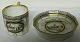 Nymphenburg 
Mocca cup and 
saucer. 
Measures 5cm x 
4,5cm and is in 
good condition.