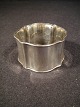 napkin ring 
silver $ 52, -