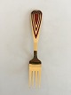 Anton Michelsen 
Christmas Fork 
2005 Gilt 
Sterling Silver 
and enamel 
Measures 16 cm 
(6.29 inch)