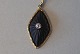 Gold Pendant, 
14 Carat Matt 
Black Onyx & 
Brilliant
 The piston 
585, AB
 Size 2.4 cm.
 ...