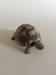 Royal 
Copenhagen 
Figurine 
Tortoise No 
552. Measures 
16cm x 6cm. Is 
marked as a 
second.