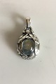 Georg Jensen 
1997 Annual 
Pendant with 
Labradorite  
Measures 2 cm / 
0 25/32 in. 
Weighs 9 g / 
0.32 oz.