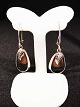 Earrings with 
amber. 925s  
Length: 4 cm 
Width: 1.2 cm 
Price $ 63, -