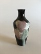 Rorstrand Art 
Nouveau vase 
Unique by 
Karl-Emil 
Lindstrøm. 
Measures 16cm 
and has a 
repair in the 
rim.