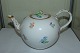 Meissen 
Porcelain 
Teapot with 
flower design. 
Measures 24cm 
and is in good 
condition.