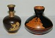 P. Ipsen vases in terracotta with motifs in greek style